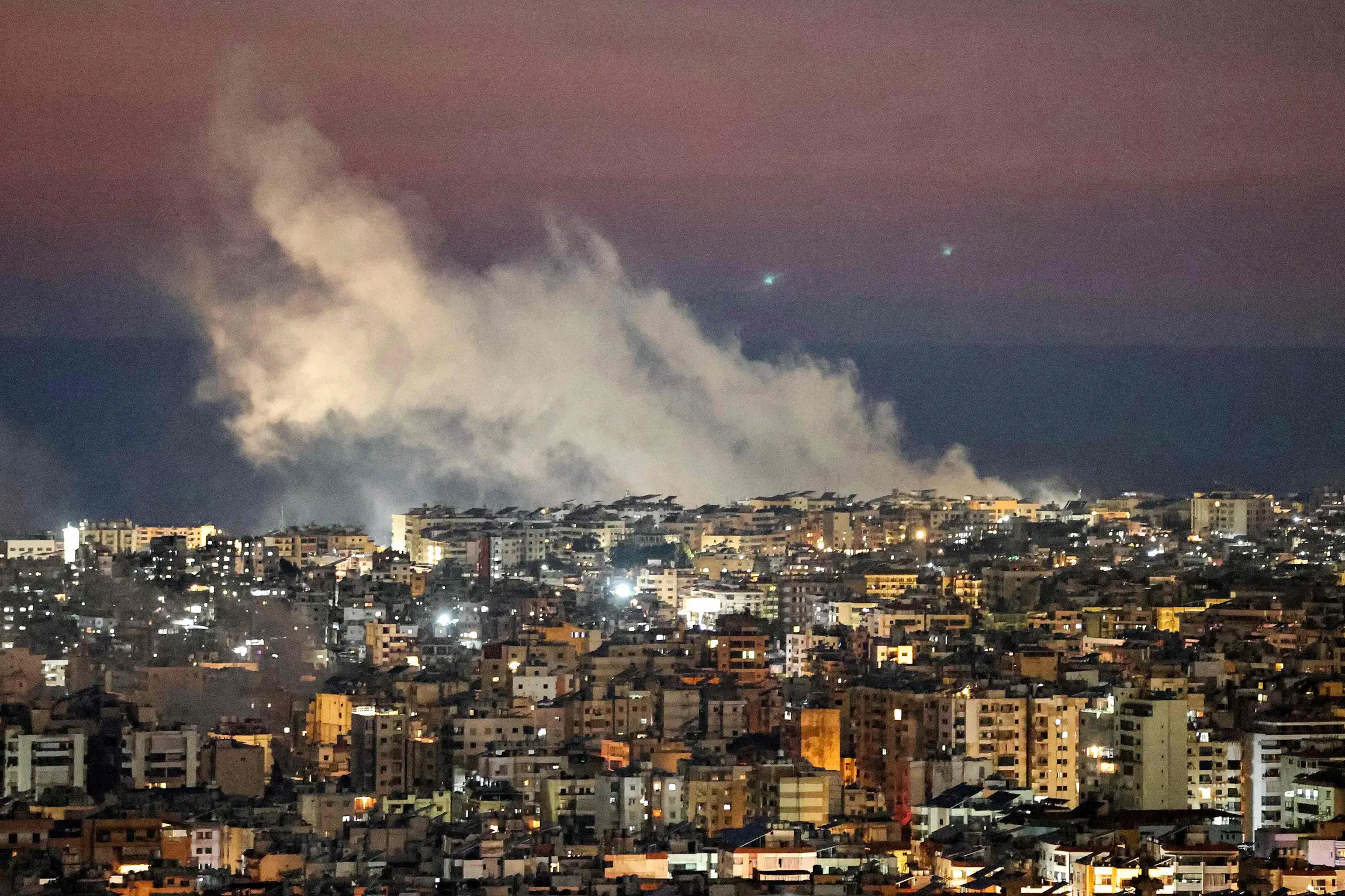 Smoke plumes billow following Israeli bombardment on Beirut's southern suburbs on March 2, 2026.IBRAHIM AMRO / AFP
