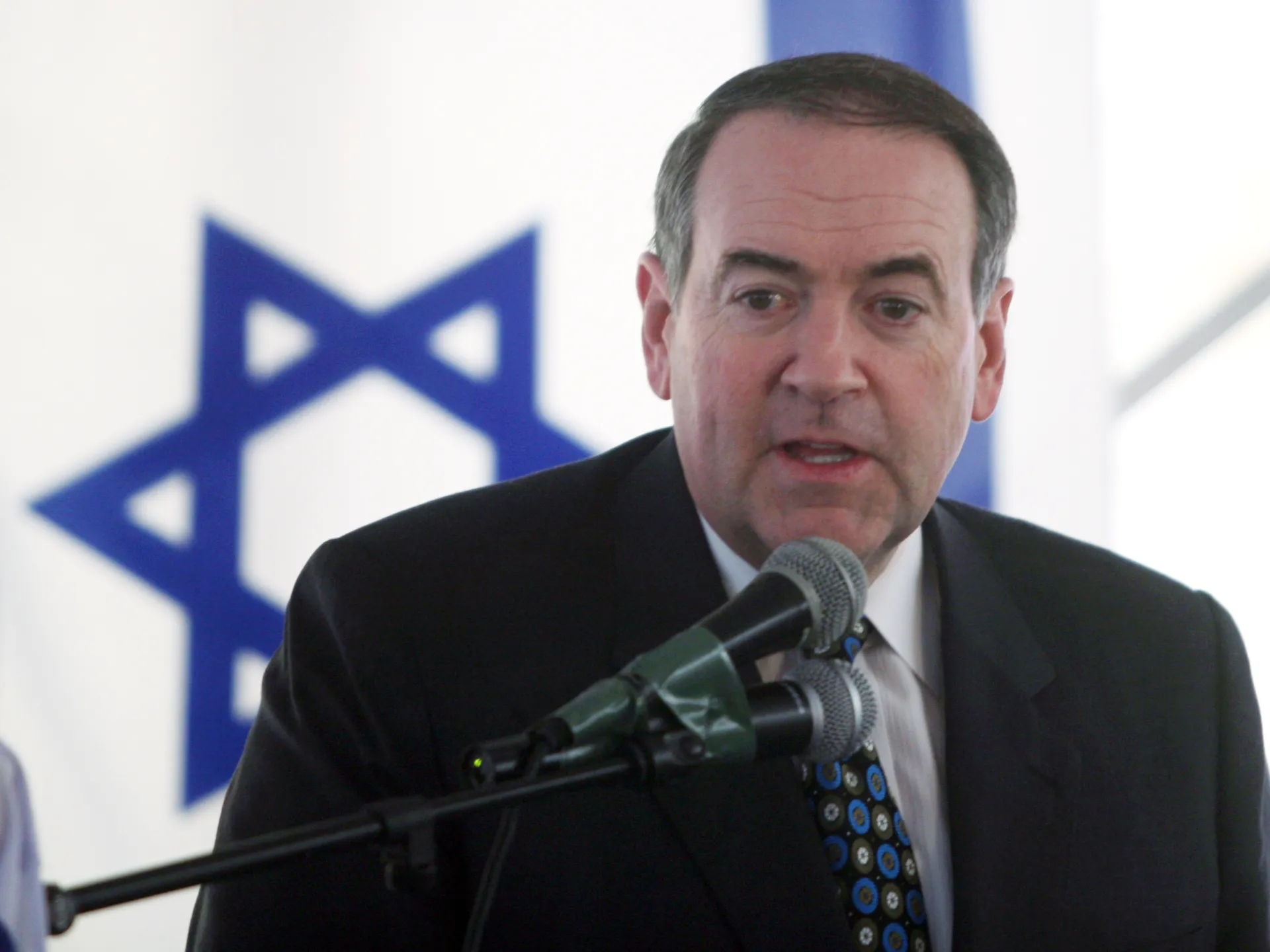 US Ambassador to Israel Mike Huckabee speaks in occupied East Jerusalem [File: Lior Mizrahi/Getty Images]
