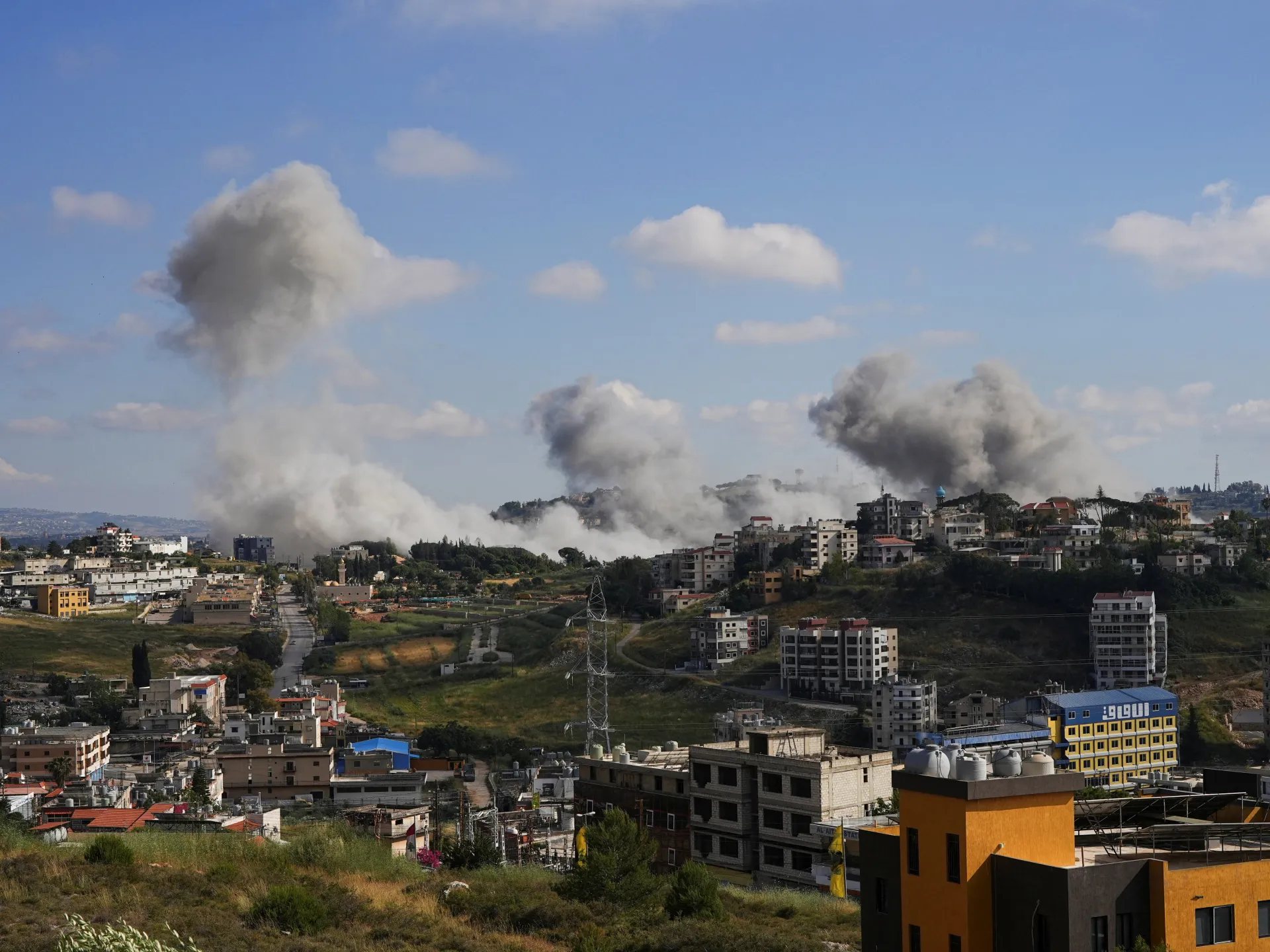 Plumes of smoke billow from southern Lebanon following Israeli strikes, as seen from Nabatieh, Lebanon, May 25, 2026. [Stringer/Reuters]