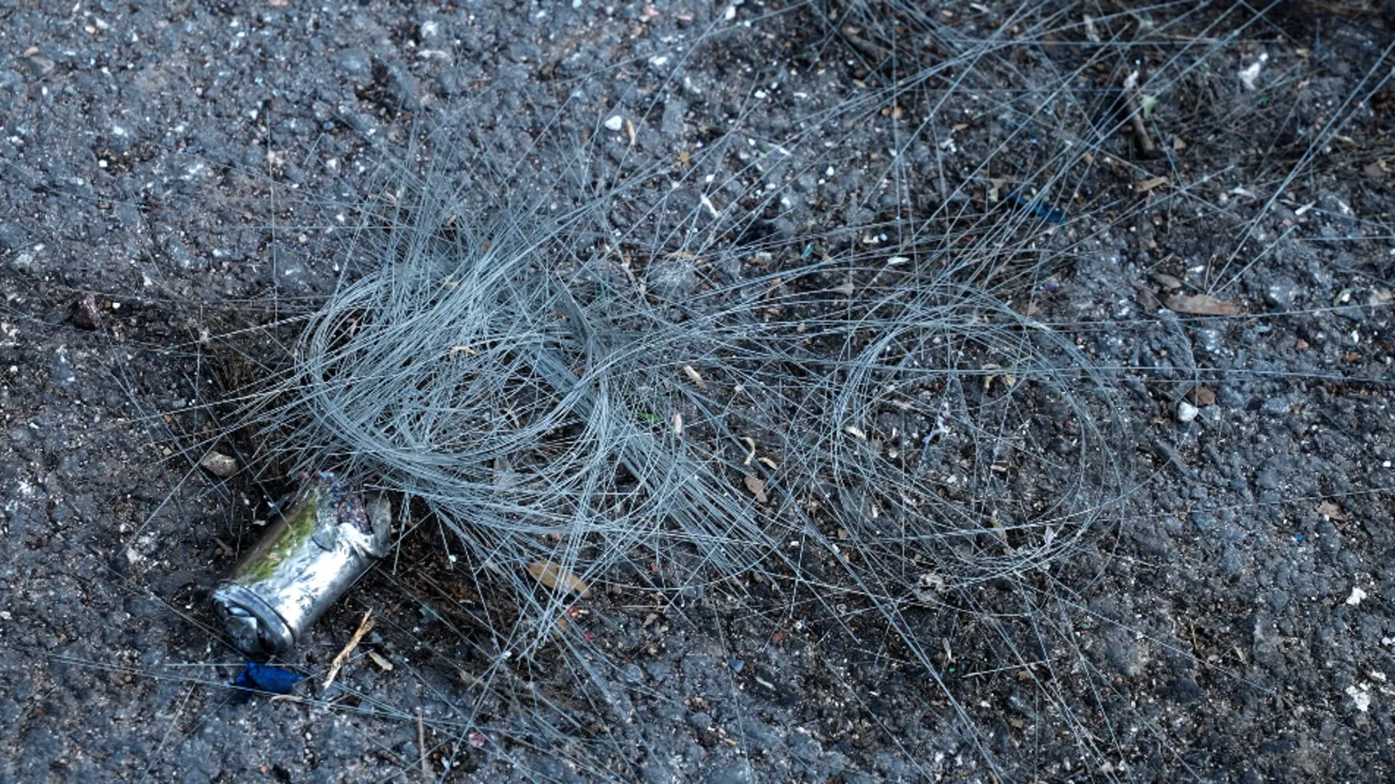 Fiber-optic drone wires scattered across northern Israeli roads following Hezbollah's latest attack near Shomera.