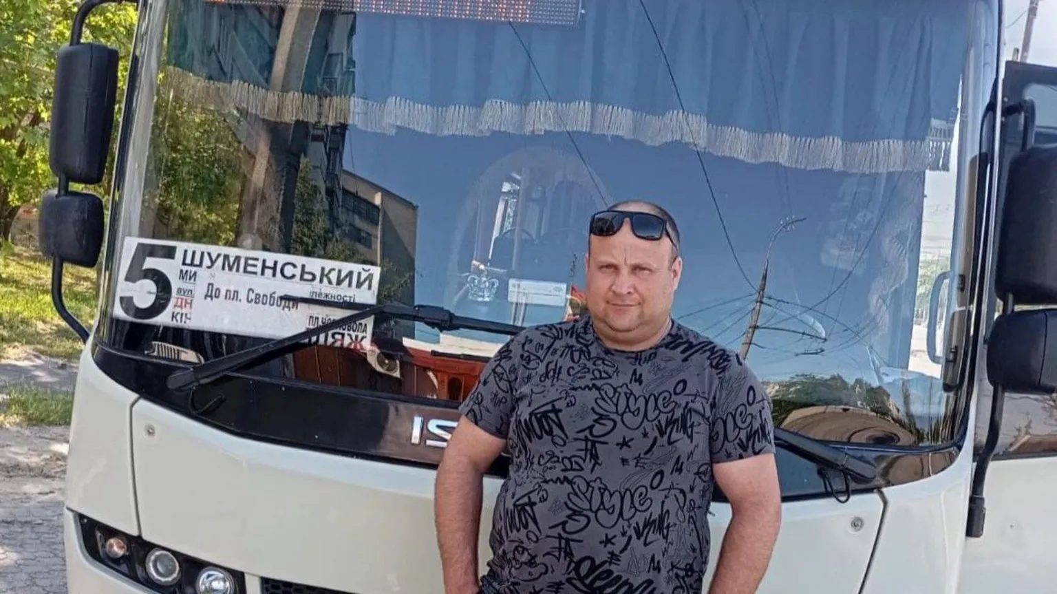 Bus driver Maksym Dyak hospitalized with broken rib and shrapnel wounds from Russian drone attack on vehicle.