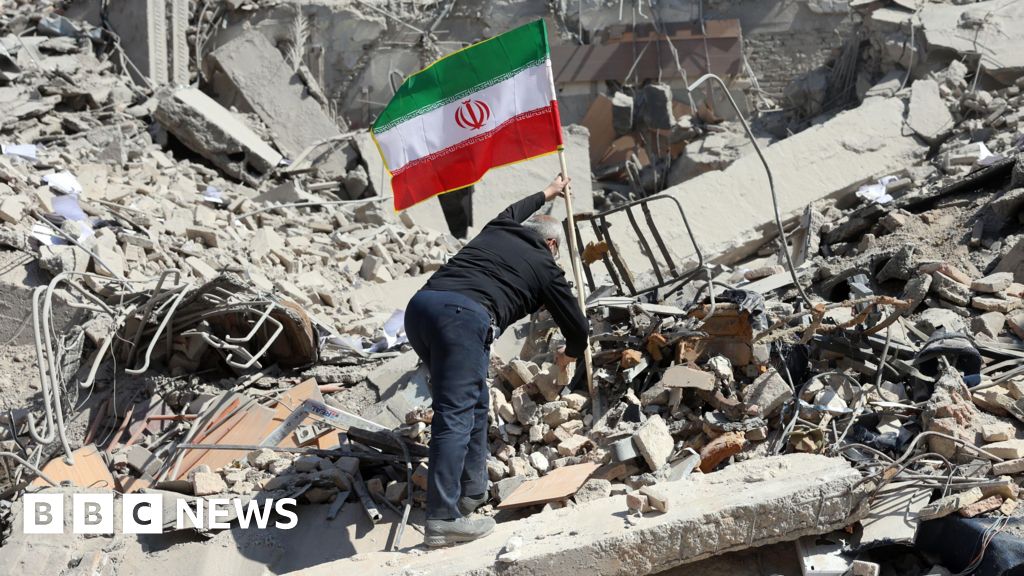 Destruction and debris visible following US-Israeli military strikes on Iranian military infrastructure targets.