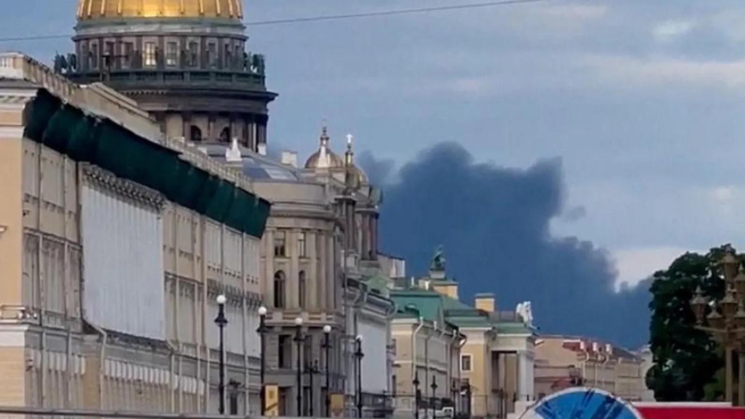Thick smoke rises over St. Petersburg following reported Ukrainian drone strikes on Russian infrastructure Wednesday.