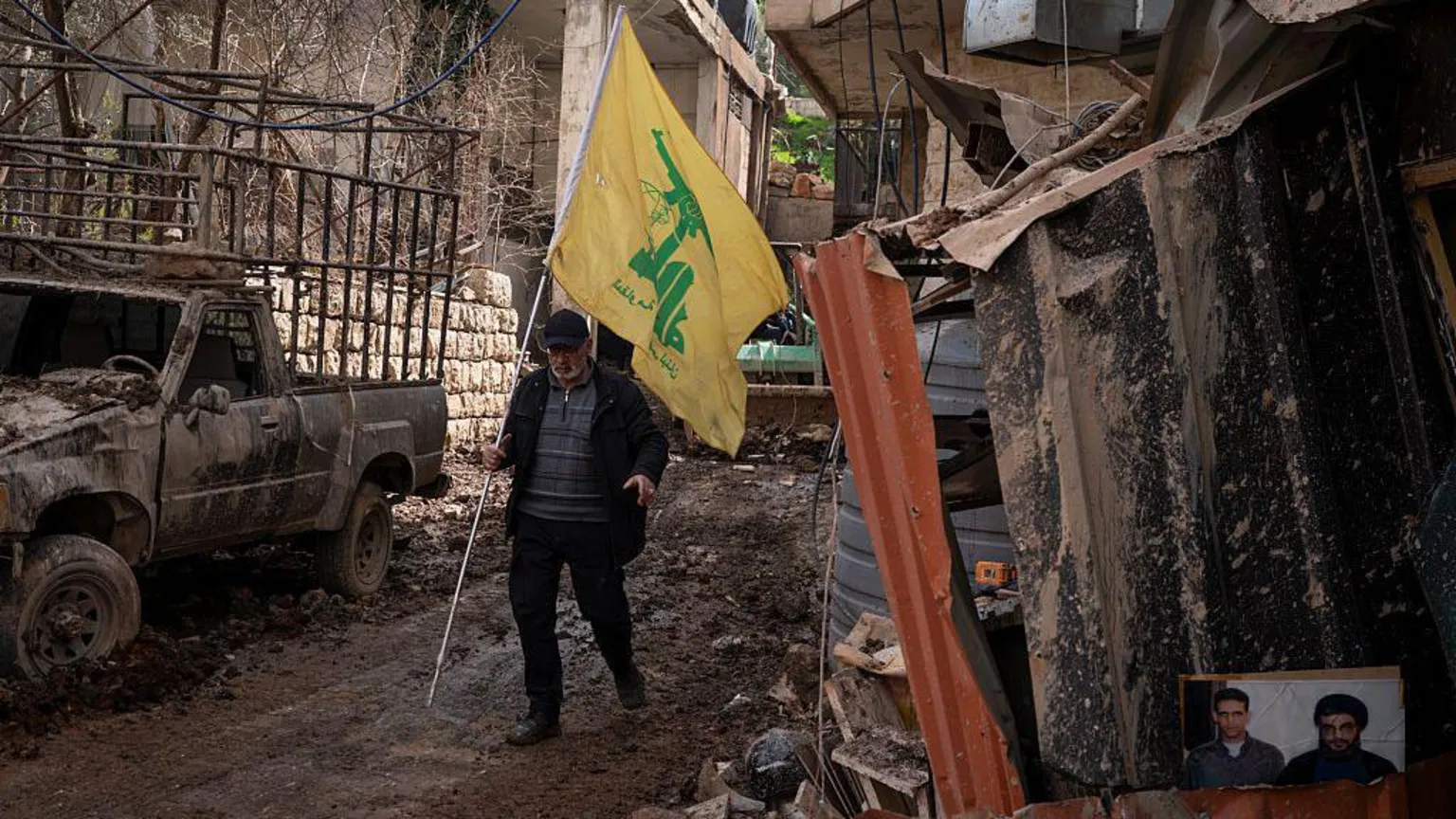 Residents gather in Nabi Chit after Israeli military operation searching for navigator missing since 1986.
