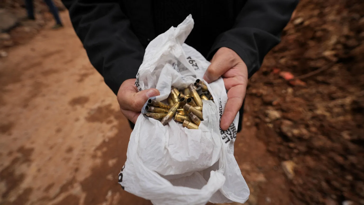 Bullet casings scattered across streets of Nabi Chit following Israeli raid that killed at least 41 people.