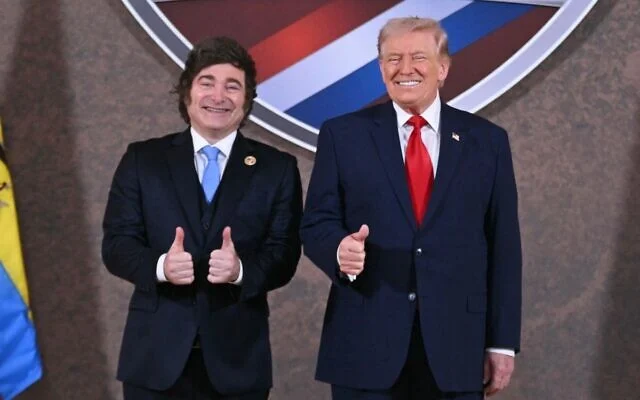 US President Donald Trump and Argentina’s President Javier Milei (L) pose for a photo at the beginning of the “Shield of the Americas” Summit at Trump National Doral in Miami, Florida, March 7, 2026. (Saul Loeb / AFP)