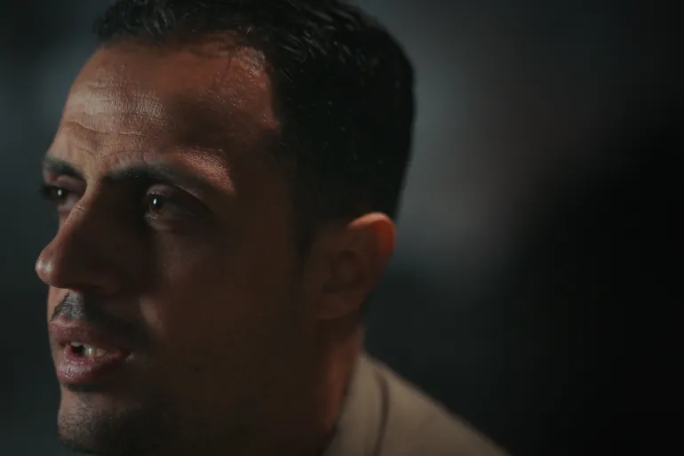Mohammed Al-Bakri describes being restrained and blindfolded during detention, part of documented abuse allegations.