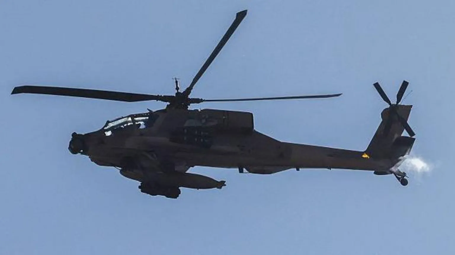 Getty Images This picture taken from a position in northern Israel, on the border with southern Lebanon, shows an Israeli Air Force AH-64 Apache helicopter flying on 4 June 2026.