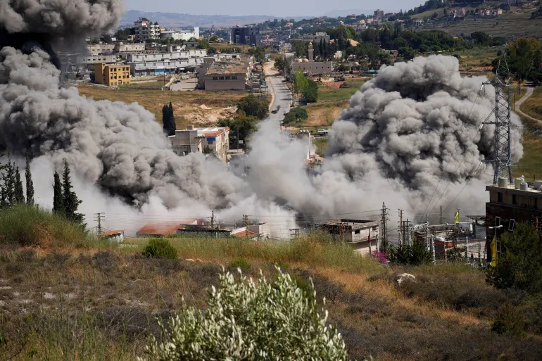 Smoke rises from southern Lebanon following Israeli strike as regional tensions persist during ceasefire talks.