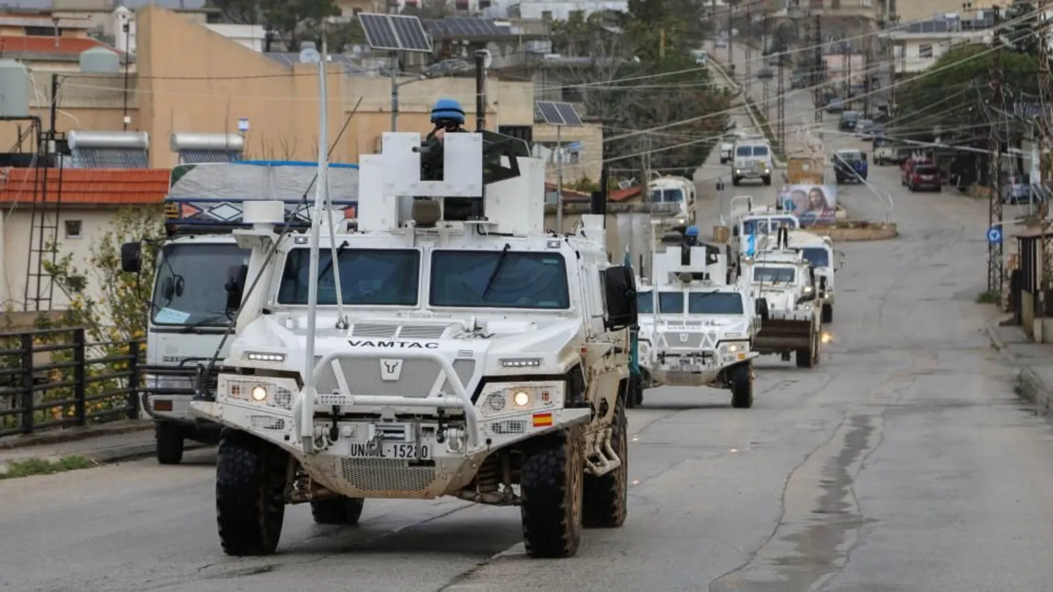 UNIFIL vehicles drive through Qlayaa in southern Lebanon following deadly explosions that killed three Indonesian peacekeepers.
