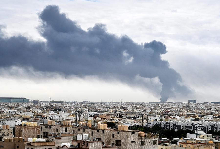 Smoke billows following a strike at a fuel depot at Kuwait International Airport in Farwaniya Governorate, Kuwait, March 25, 2026. (Xinhua)