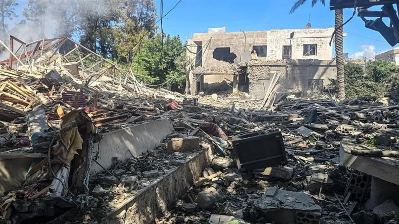 A photograph shows the aftermath of an Israeli strike in the area of Aamriyeh, south of Tyre in southern Lebanon