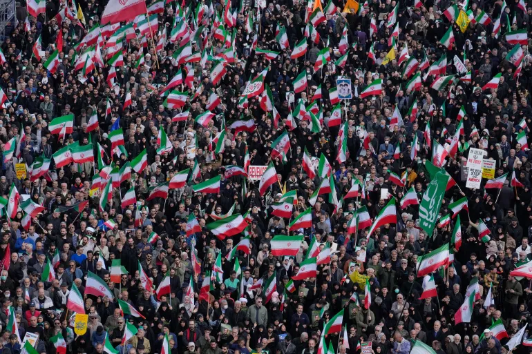 Mourners gather during funeral procession in Tehran for senior Revolutionary Guard commander Alireza Tangsiri on April 1, 2026.