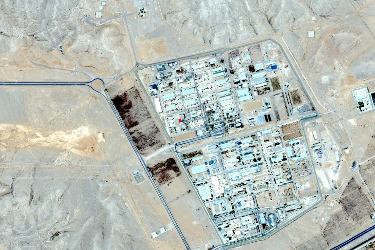 Satellite image shows truck at Iranian nuclear site under scrutiny amid uranium enrichment concerns.