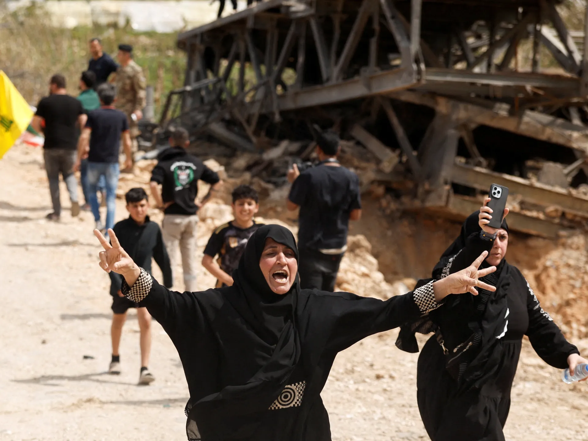 Displaced people make their way back to their homes, in Qasmiyeh, Lebanon, on April 17, 2026 [Louisa Gouliamaki/Reuters]