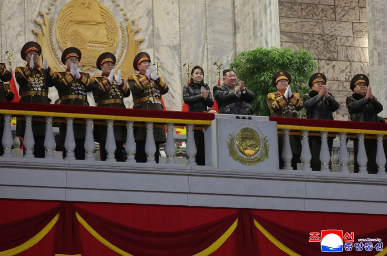 North Korean leader Kim Jong Un and his daughter Kim Ju Ae attend a military parade to mark the conclusion of the Ninth Congress of the ruling Workers’ Party of Korea in Pyongyang, North Korea, on February 25, 2026 [KCNA via Reuters]