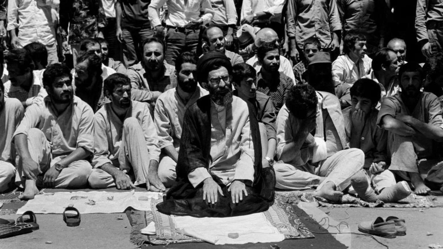 Khamenei at prayer in Tehran after the Iranian revolution in 1979