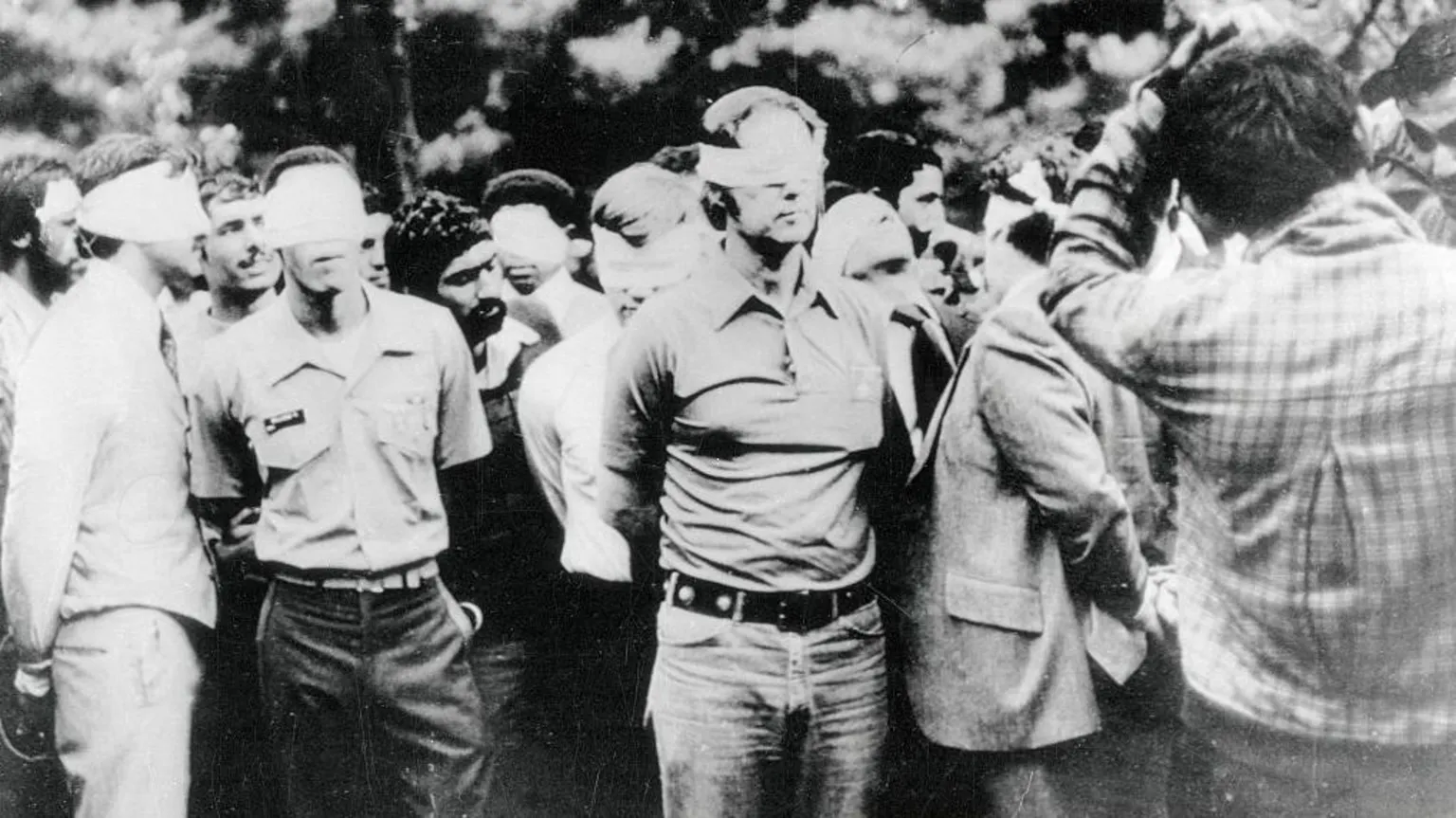 American hostages being paraded by their militant Iranian captors after the US embassy was occupied