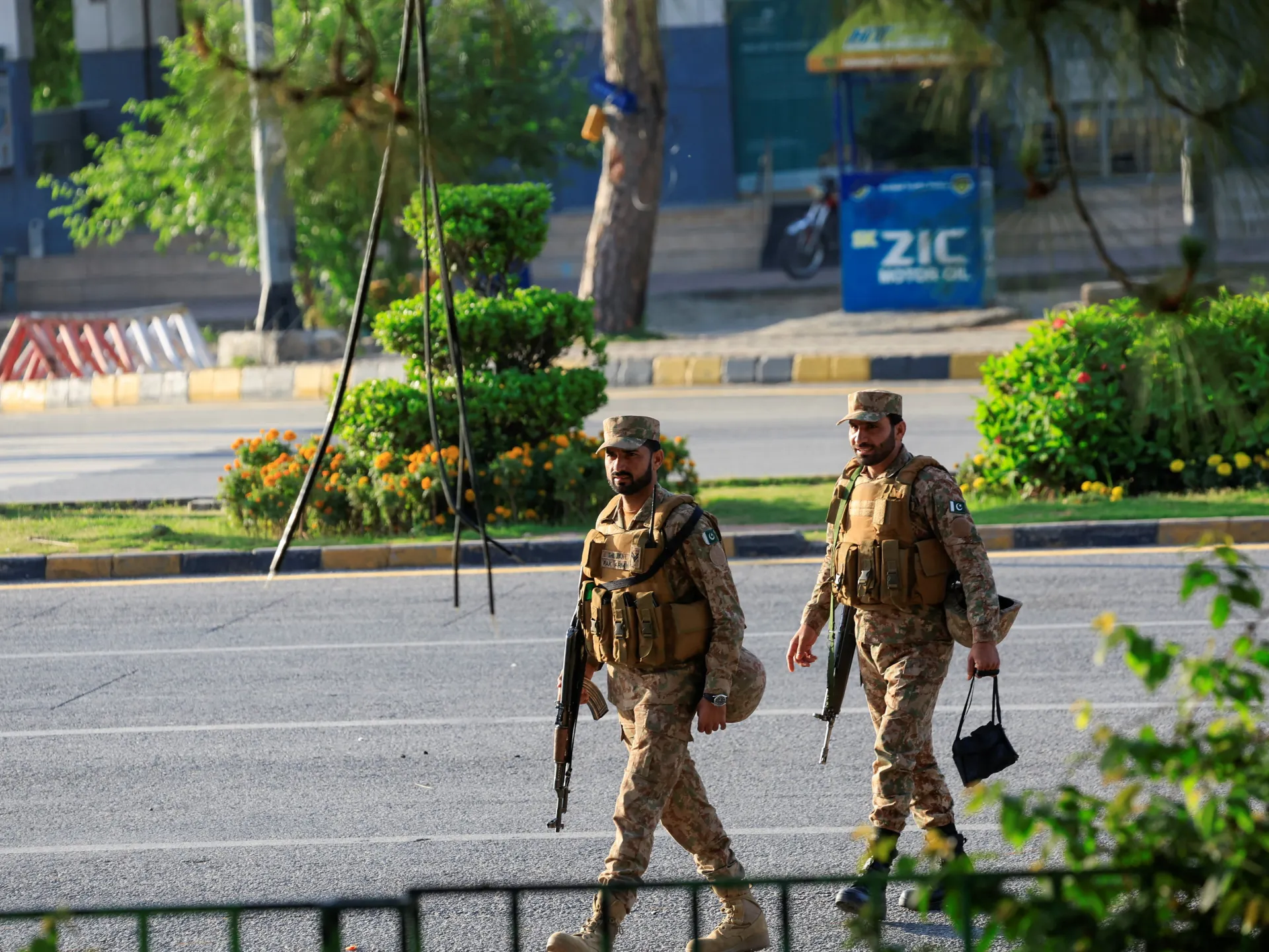 Soldiers patrol in Islamabad as Pakistan prepares to host the US and Iran for the second phase of peace talks, April 21, 2026 [Akhtar Soomro/Reuters]