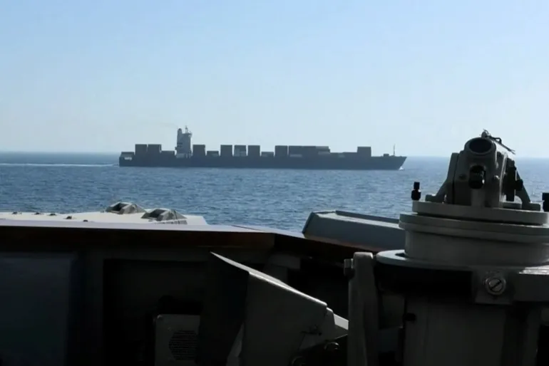 The USS Spruance is seen intercepting the Iranian-flagged cargo ship M/V Touska in the north Arabian Sea in this screengrab from a video released on April 19, 2026 [Handout/CENTCOM via Reuters]