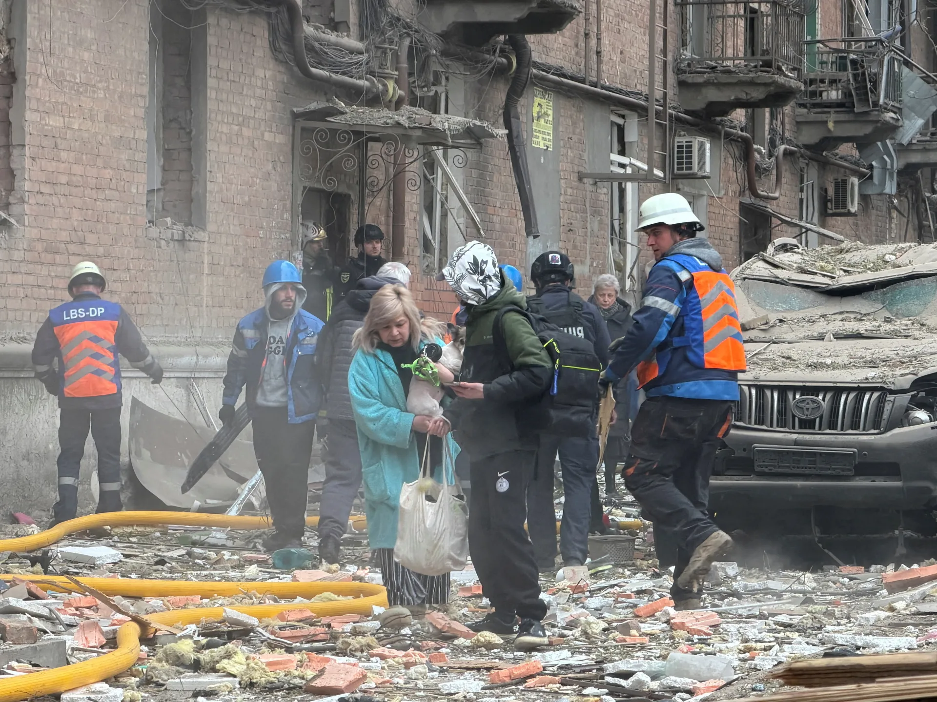 An apartment building hit in Dnipro. Russian drone and missile strikes overnight also targeted other regions across Ukraine. April 25, 2026 [Serhii Chalyi/Reuters]