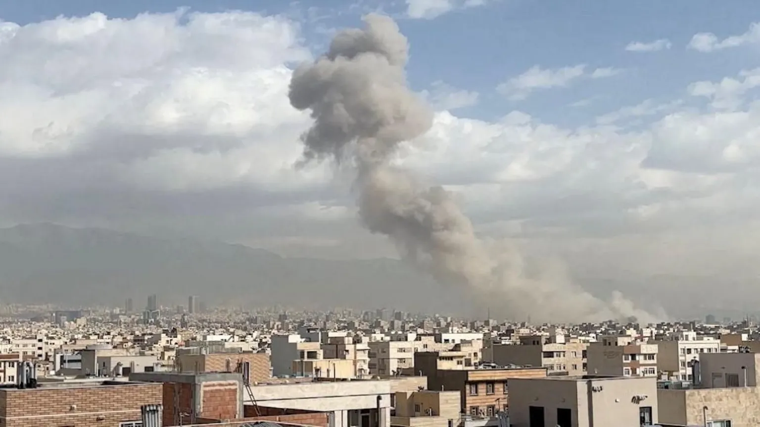 Smoke billows over Tehran following massive US-Israeli aerial bombardment of Iranian military targets.
