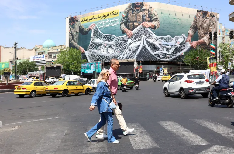 Iranian billboard declares 'The Strait of Hormuz remains closed' as Tehran proposes reopening negotiations.