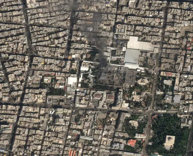 This image provided by Airbus shows the strike on Iranian...