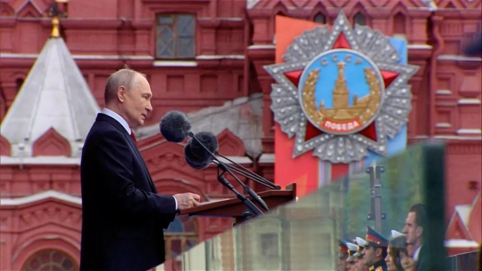 Vladimir Putin addresses crowd at Red Square Victory Day ceremony, defending Ukraine conflict as 'just war' against NATO-backed aggression.