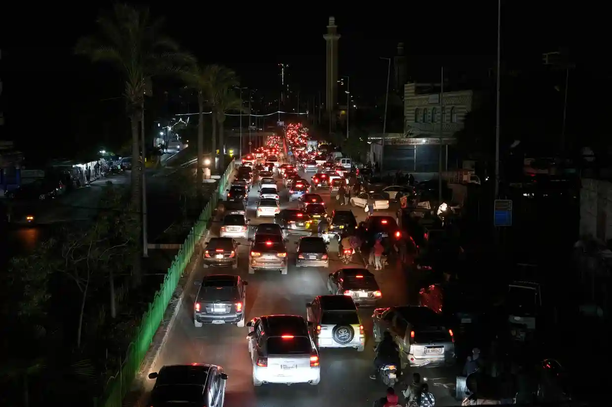 Cars sit in traffic as residents flee Israeli airstrikes in Dahieh