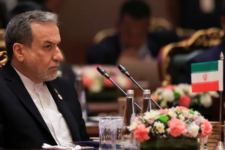 Iran's Foreign Minister Abbas Araghchi attends BRICS foreign ministers' meeting in New Delhi amid divisions over US-Israel conflict.