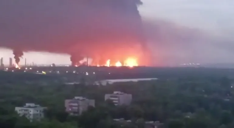 Smoke billows from Ryazan oil refinery following reported drone activity in western Russia, May 15, 2026.